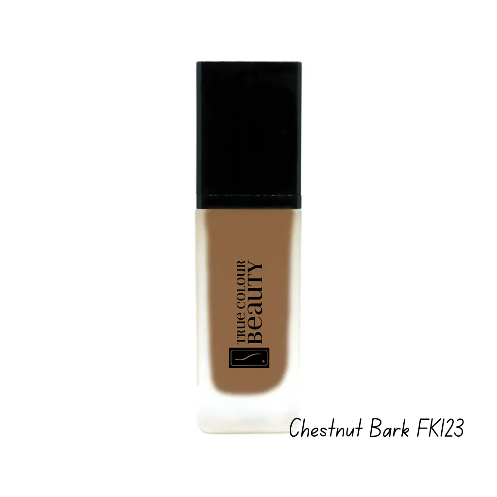 Foundation bottle with black cap and brown body on a white background