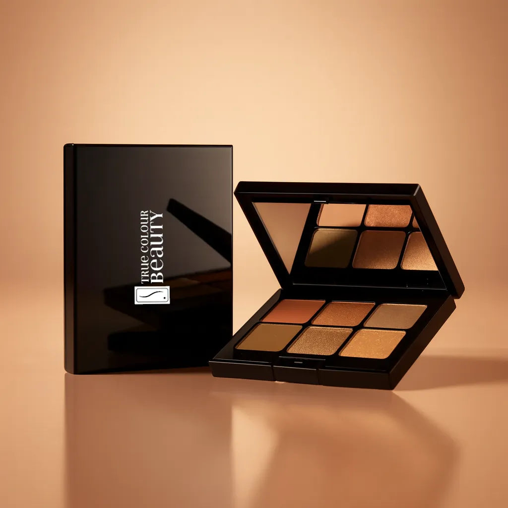 Makeup palette with open lid showing shades and closed black case on a beige background