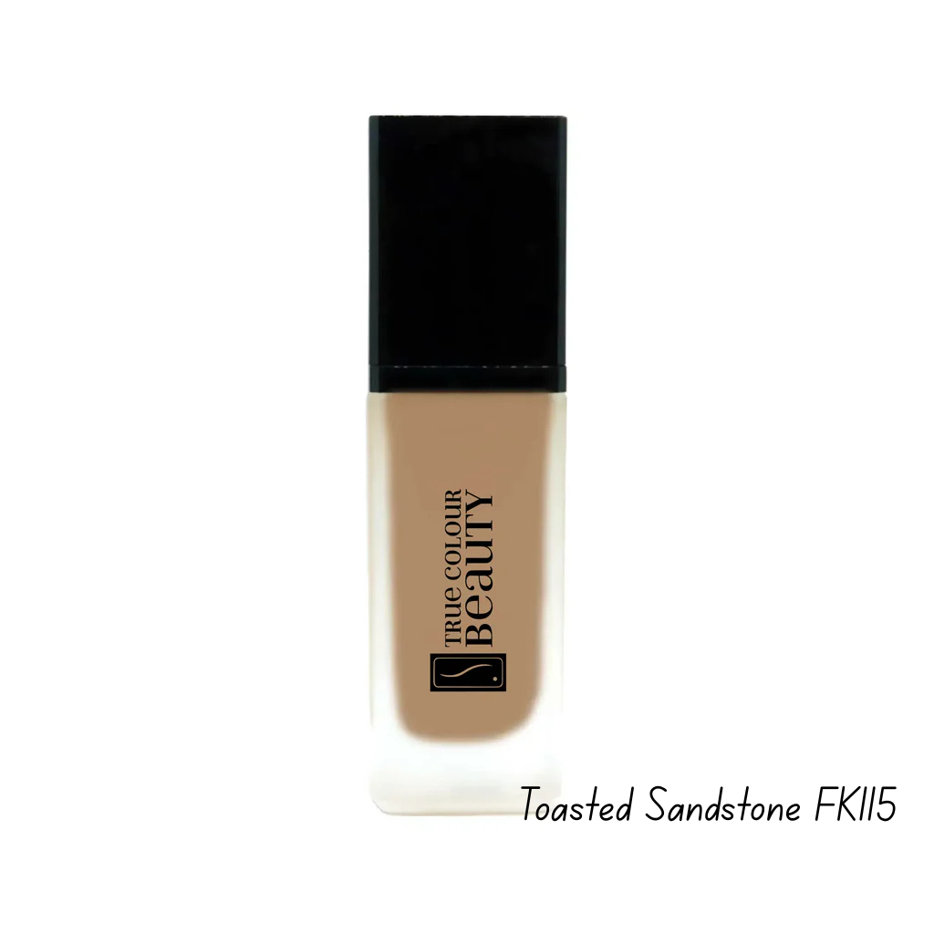 Foundation bottle labeled 'True Colour Beauty' in Toasted Sandstone FK115 on a white background