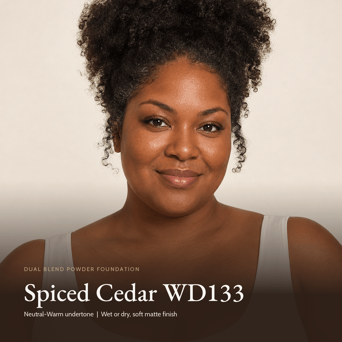 Model wearing Dual Blend Powder Foundation in Spiced Cedar WD133