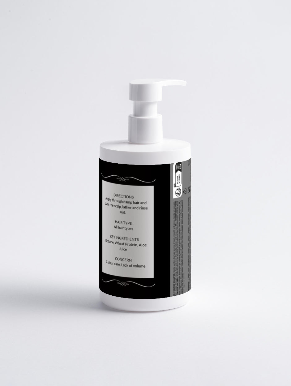 White bottle with black label on a light gray background