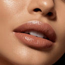 Close-up of a person's lips with a focus on texture and color.