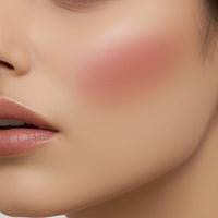 Close-up of a person's face with blush on cheeks