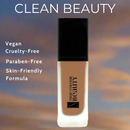 Foundation bottle with 'true colour BEAUTY' branding against a blurred natural background, featuring text about product attributes.