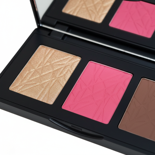 Makeup palette with pink, brown, and beige shades on a white background