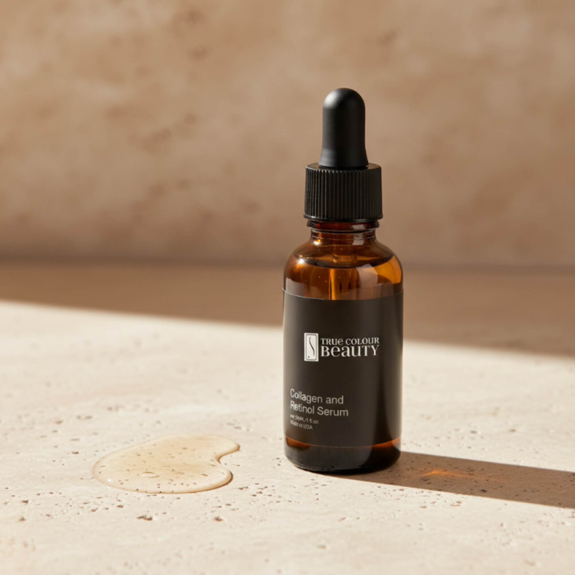Brown serum bottle with dropper labeled 'Three Colour Beauty' on a beige surface.