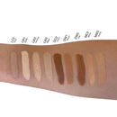 Creme Concealer Stick - Moka showcased on an arm with various shades, illustrating its coverage versatility for blemishes and contouring. Compact and eco-friendly design ideal for on-the-go use.