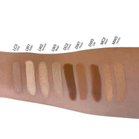 Creme Concealer Stick - Moka showcased on an arm with various shades, illustrating its coverage versatility for blemishes and contouring. Compact and eco-friendly design ideal for on-the-go use.