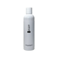 TCB Daily Curl Shampoo bottle, formulated to gently cleanse and enhance curls while providing moisture for healthy-looking hair.