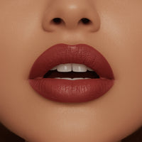 Close-up of a person's lips with a focus on the lipstick color.