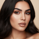 Close-up of a woman with dark hair and makeup on a beige background