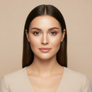 Woman with long brown hair against a beige background