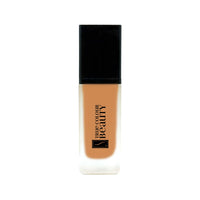 Earthbound Liquid Foundation – Golden Marigold bottle, a cosmetic product offering medium to full coverage with a dewy finish, suitable for all skin types.