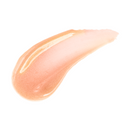 Close-up of a peach-colored lip gloss swatch on a white background