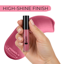 Hand holding a pink lip gloss with a pink background and 'HIGH-SHINE FINISH' text.