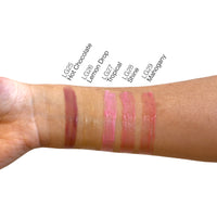 True Shine Lip Gloss arm swatches with five colors.