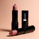 Pink lipstick with black packaging on a beige background