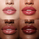 Close-up of lips with different shades of pink and red on a neutral background