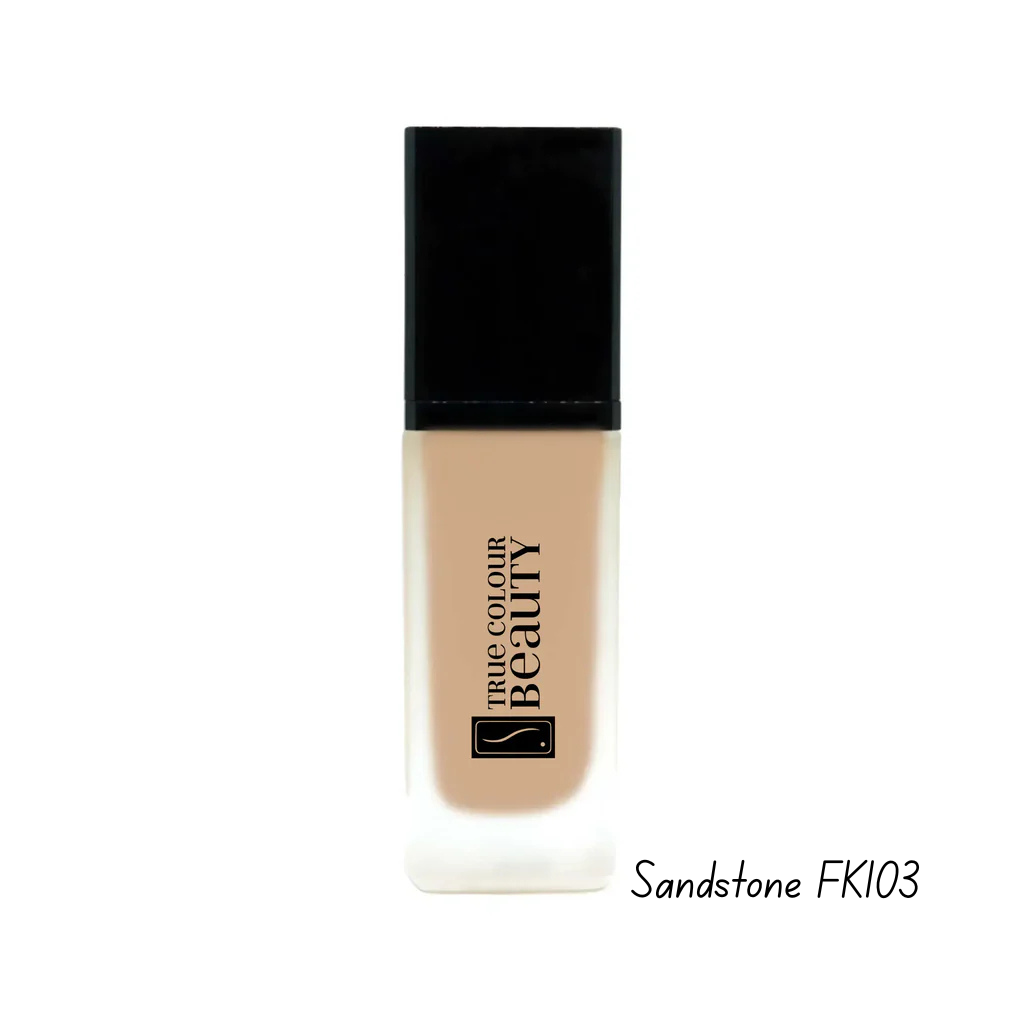 Foundation bottle with black cap and beige body on a white background