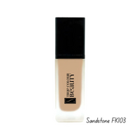 Foundation bottle with black cap and beige body on a white background