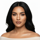 Woman with long black hair and neutral makeup on a white background