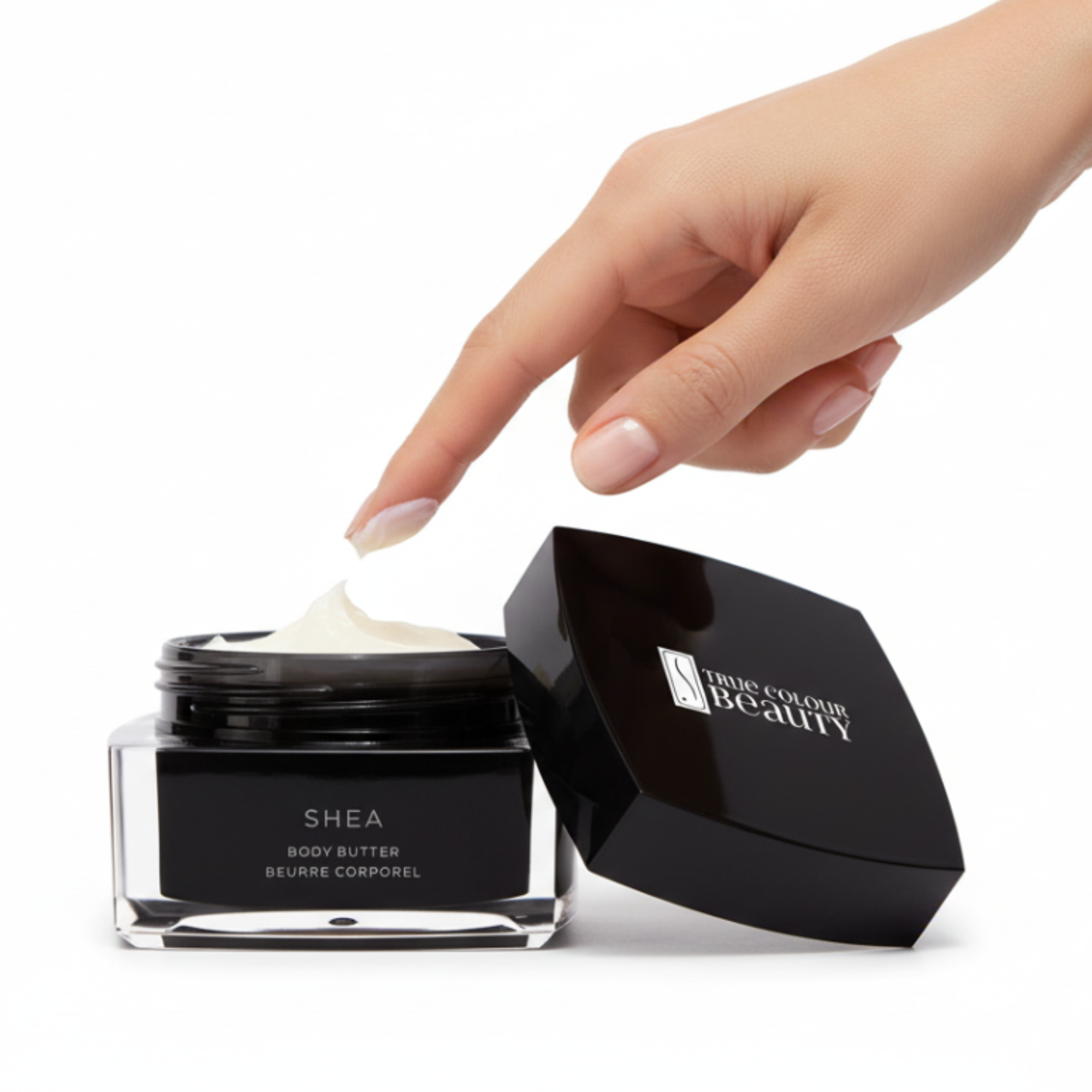 Hand applying shea body butter from a black jar with 'Blue Cloud Beauty' branding.