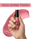 Hand holding a lip gloss with a pink background and 'HIGH-SHINE FINISH' text.