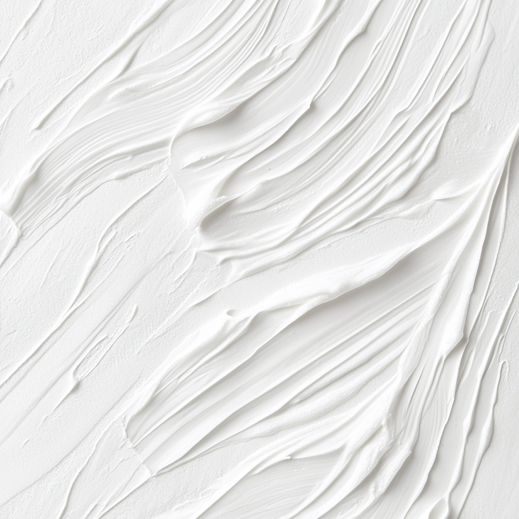 Close-up of white lotion with a soft texture