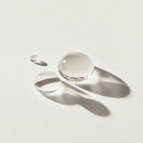 Clear droplets on a light gray background