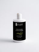 True Colours Beauty True Gloss Conditioner bottle on a white background