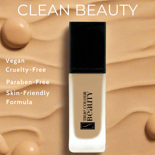 Foundation bottle with 'True Colour Beauty' branding on a beige background, featuring text about product attributes.