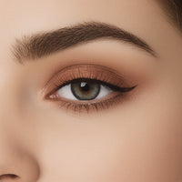 Close-up of a person's eye with brown eyeshadow