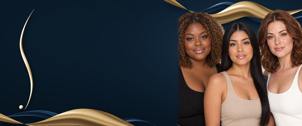 Three smiling women with different skin tones wearing natural makeup and glossy lips, on a deep navy background with shiny champagne gold ribbons and the True Colour Beauty curve.