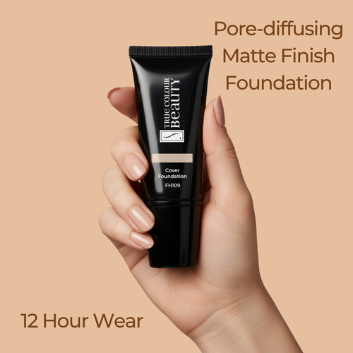 Hand holding a black foundation tube with text about pore-diffusing matte finish and 12-hour wear on a beige background