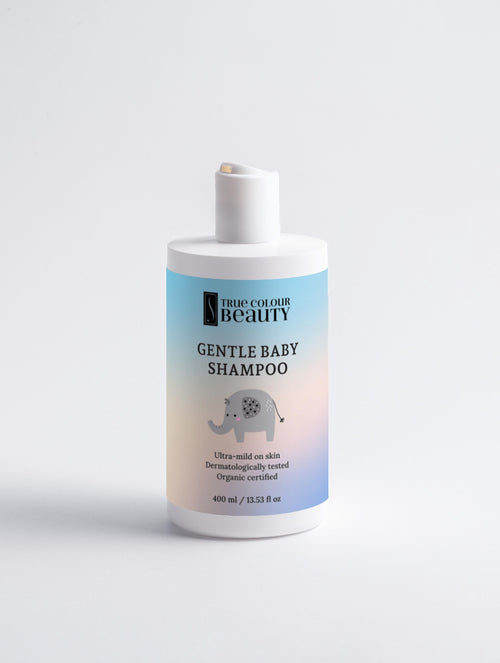 Bottle of Gentle Baby Shampoo with a blue label on a white background