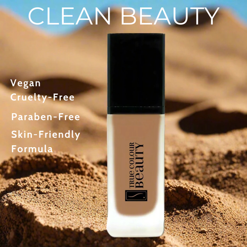 Foundation bottle with 'True Colour Beauty' branding on a desert background, featuring text about product attributes.