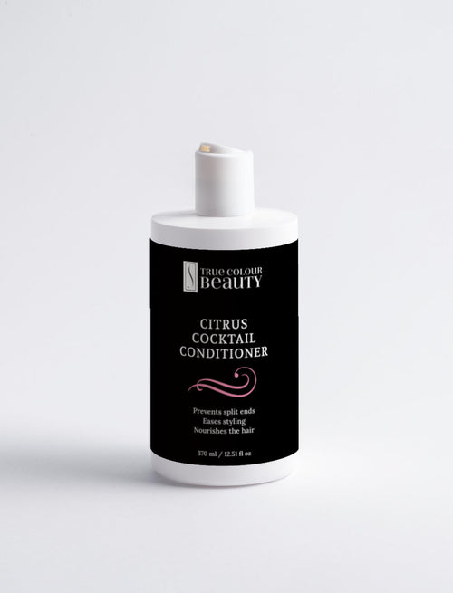 Bottle of Citrus Cocktail Conditioner with black label on a white background