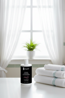 Bathroom counter with plant in window
