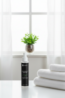 Bathroom counter with plant in window
