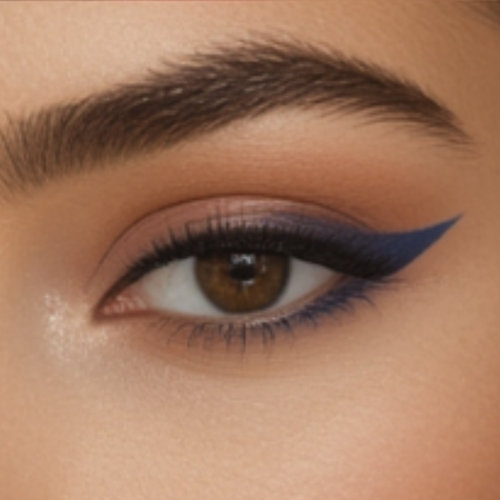 Close-up of a brown eye with blue eyeliner on a beige background