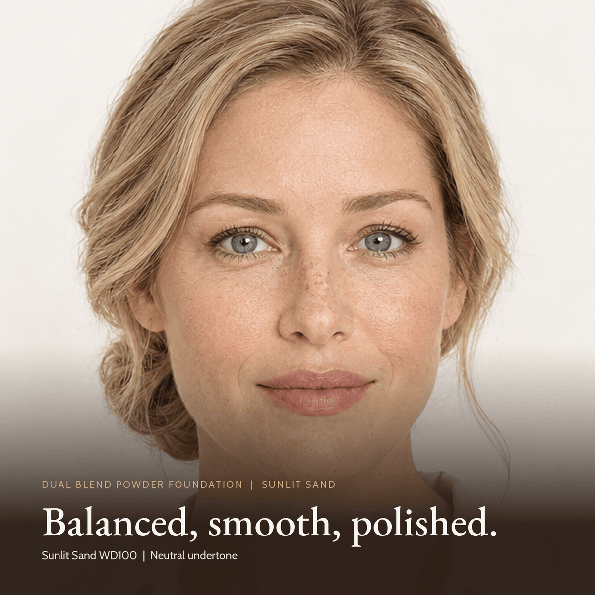 Close-up of model wearing Dual Blend Powder Foundation in Sunlit Sand