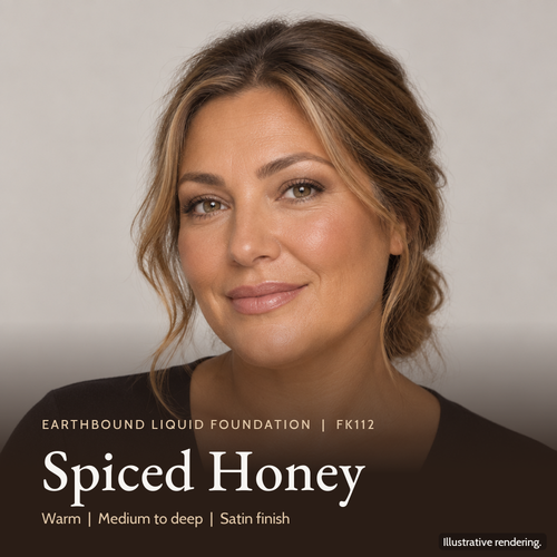 Model wearing Earthbound Liquid Foundation in Spiced Honey FK112 for an even, natural-looking complexion.