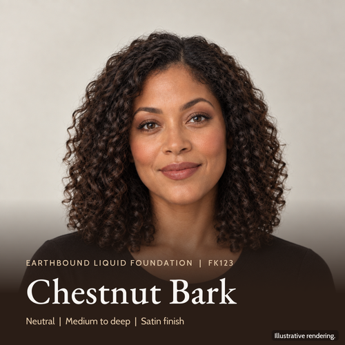 Model wearing Earthbound Liquid Foundation in Chestnut Bark FK123 for an even, natural-looking complexion.