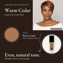 Warm Cedar FK125 shade card with a model photo, a color swatch and the Earthbound Liquid Foundation bottle.