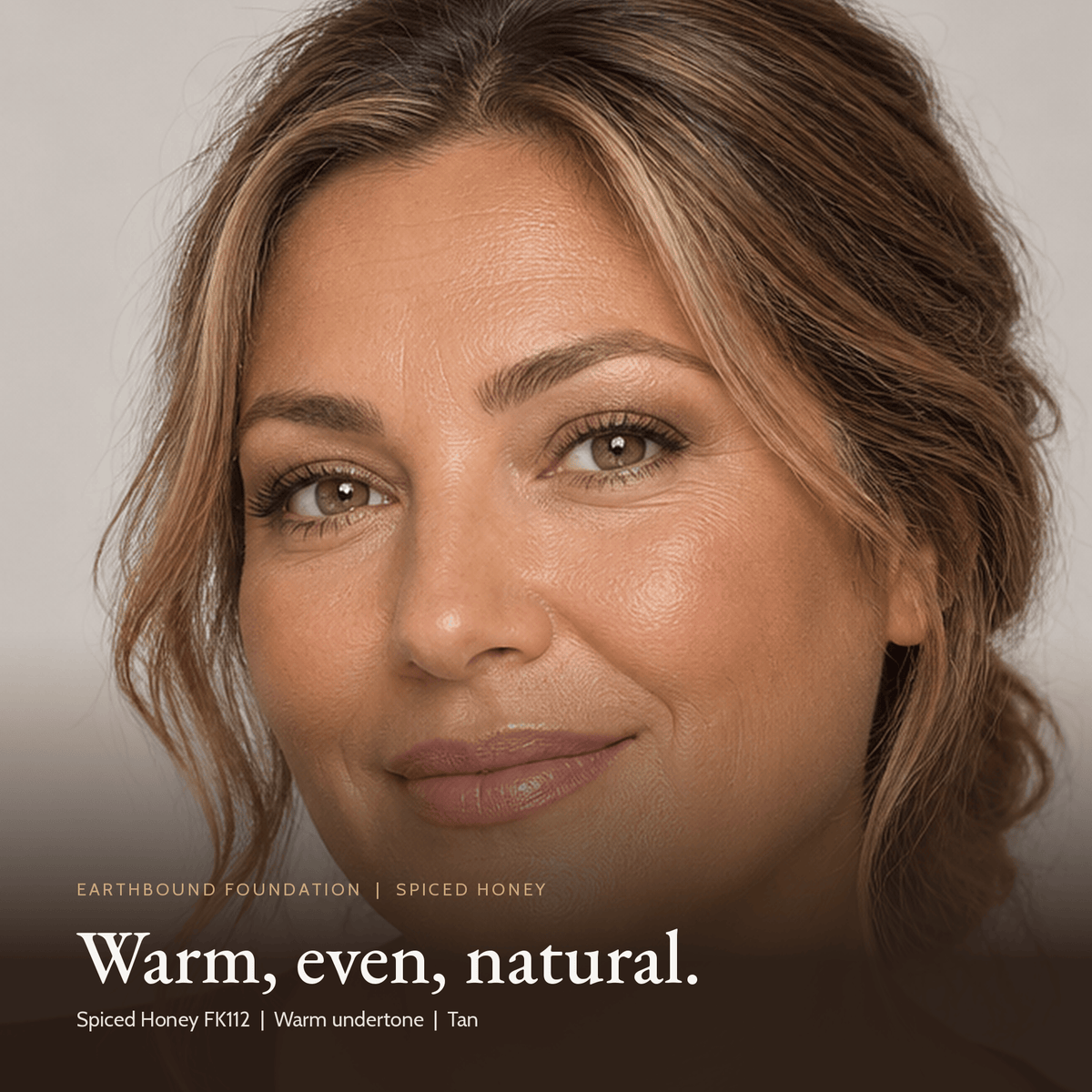 Close-up of model for Earthbound Liquid Foundation in Spiced Honey