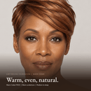 Close-up of model for Earthbound Liquid Foundation in Warm Cedar