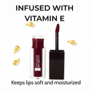 Lipstick with applicator and text 'Infused with Vitamin E' on a white background