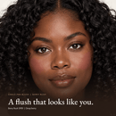 Close-up of model for Single Pan Blush in Berry Rush