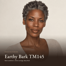 Model wearing Tinted Moisturizer in Earthy Bark TM145