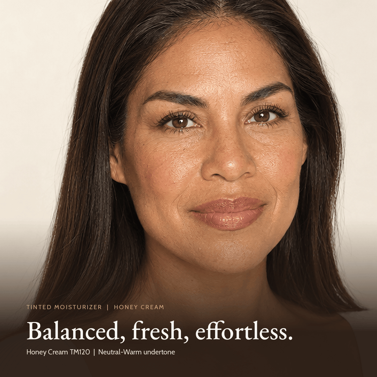 Close-up of model wearing Tinted Moisturizer in Honey Cream